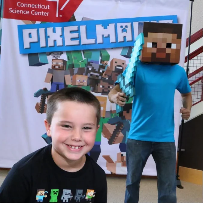 A young visitor at the Science Center Pixelmania Minecraft-themed event